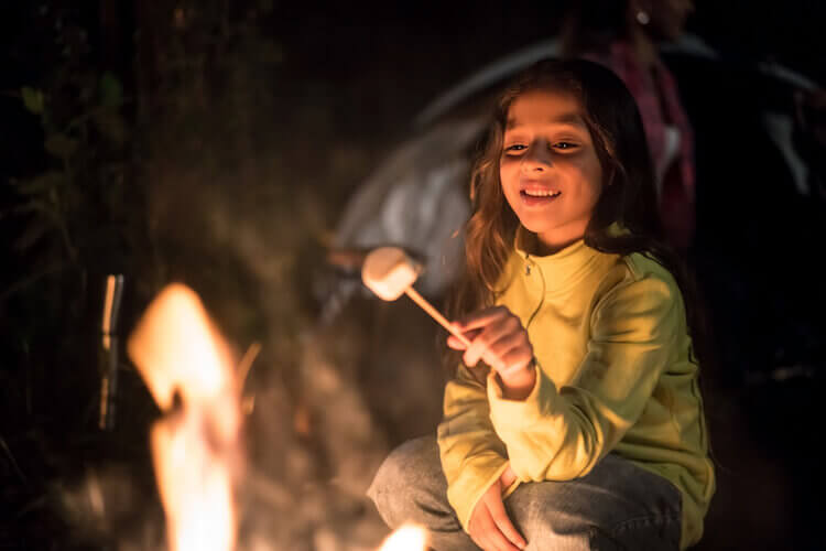 Roofnest Blog, Girl roasting marshmellow